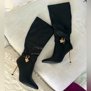 Black pointed toe padlock and key stiletto heeled boots